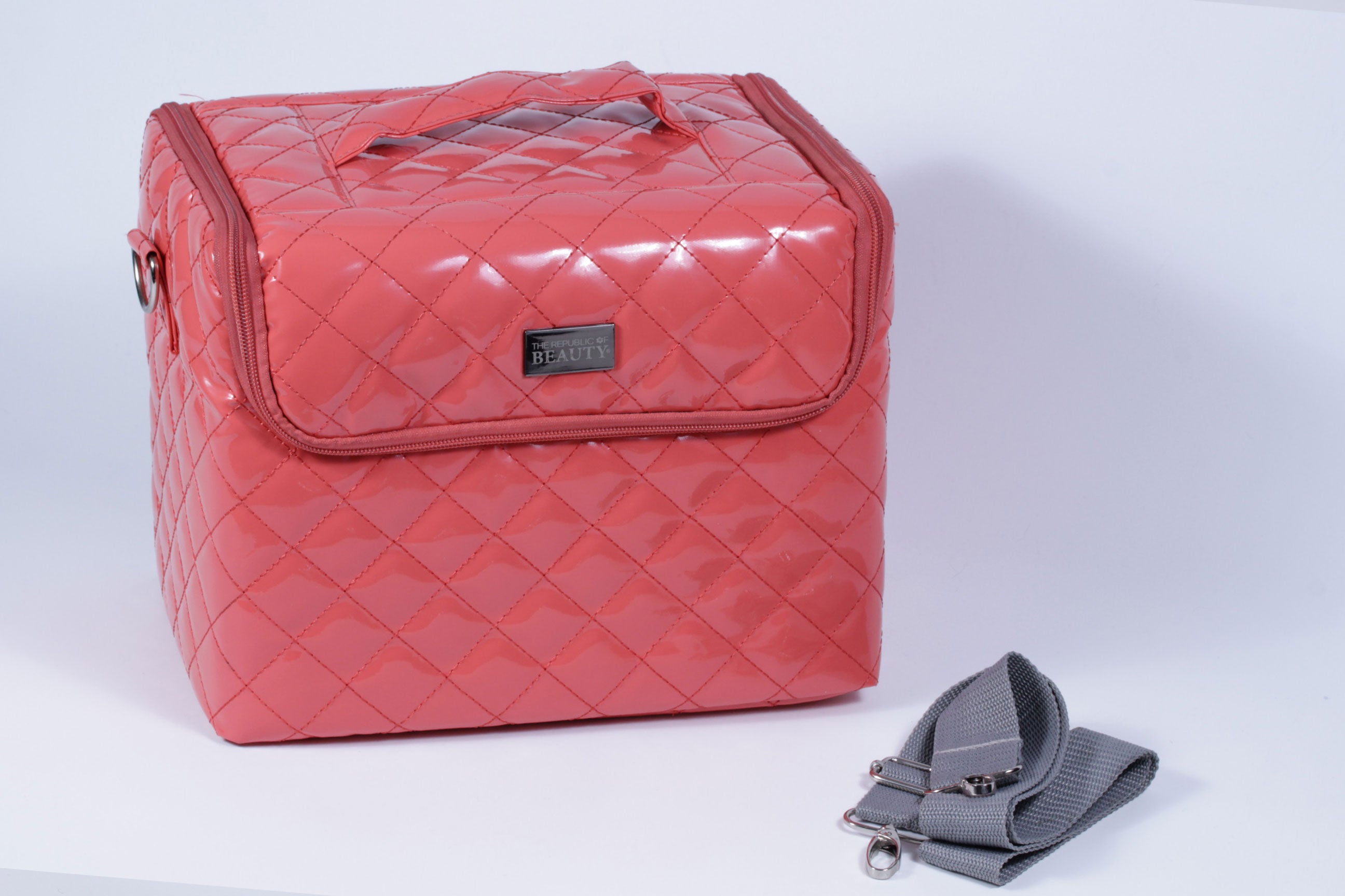 Maleta de maquillaje The Republic of Beauty color coral