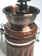 Moledora manual de café con recipiente cerámico