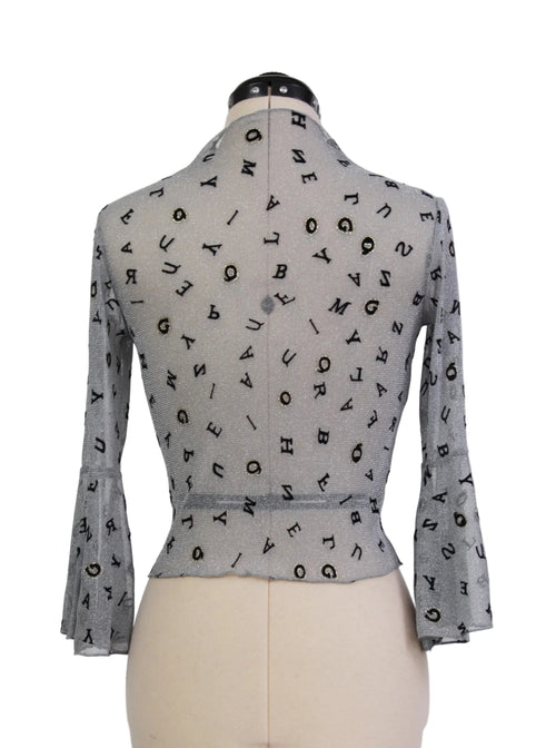 Blusa translúcida con estampado de letras | Talla XS