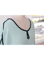 Blusa verde agua detalle negro manga corta fluida | Talla M