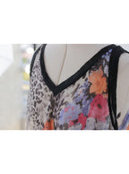 Blusa estampada animal print flores corte asimétrico | Talla XL