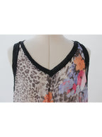 Blusa estampada animal print flores corte asimétrico | Talla XL