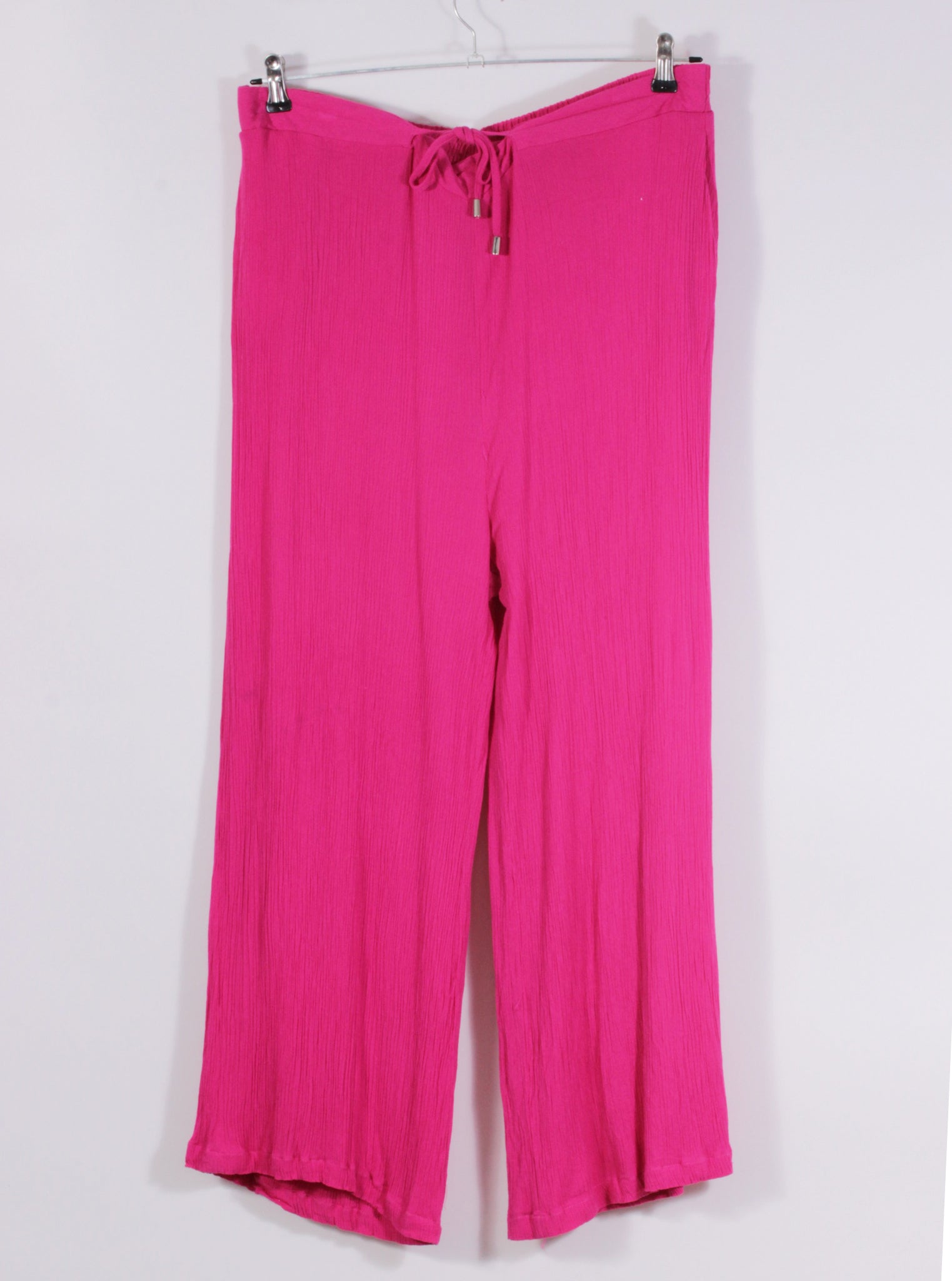 Pantalón fluido rosa ajuste metálico | Talla XL