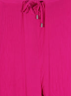 Pantalón fluido rosa ajuste metálico | Talla XL