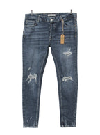 Jeans skinny desgastados tiro medio | Talla 44