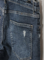Jeans skinny desgastados tiro medio | Talla 44