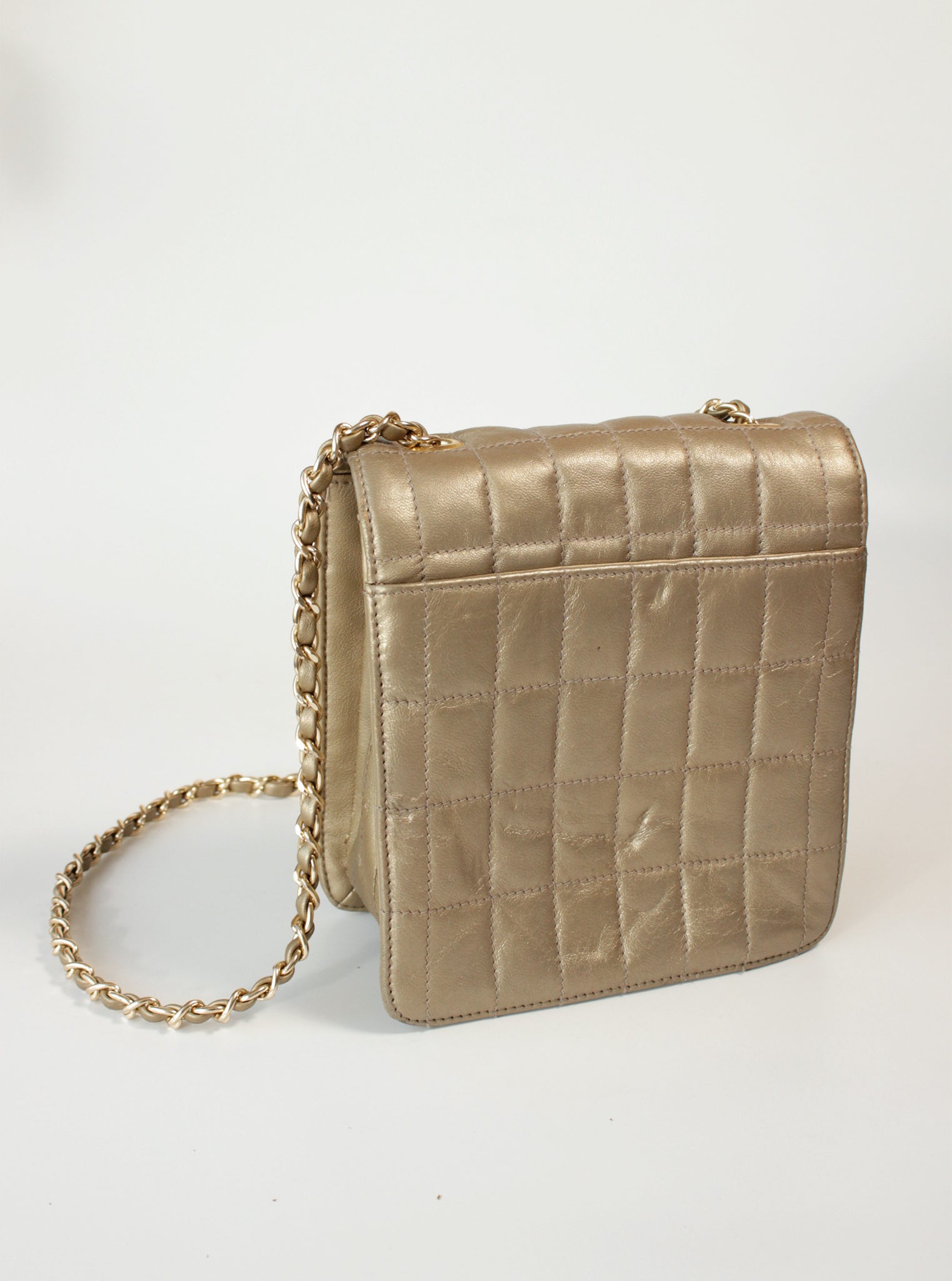 Cartera acolchada cadena metálica broche giratorio