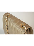 Cartera acolchada cadena metálica broche giratorio