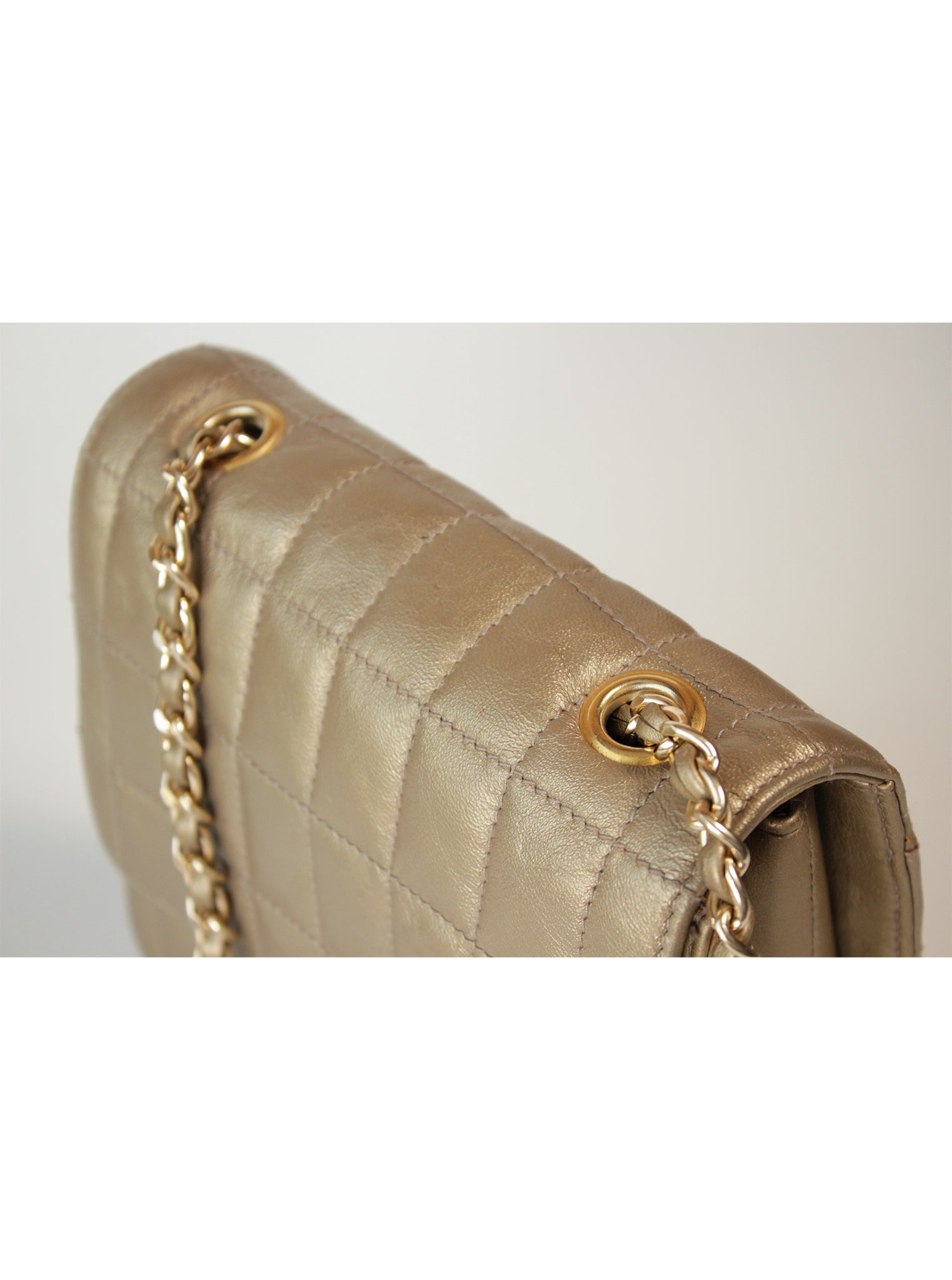 Cartera acolchada cadena metálica broche giratorio
