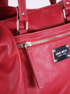 Cartera corto con cierre superior y diseño clásico