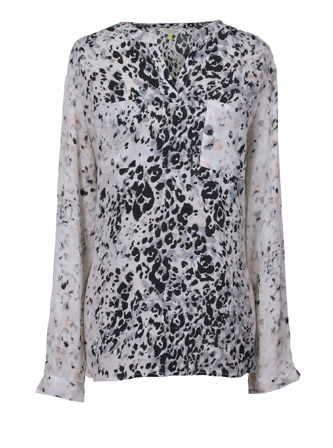 Blusa manga larga blanco y negro con diseño de manchas