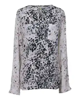 Blusa manga larga blanco y negro con diseño de manchas