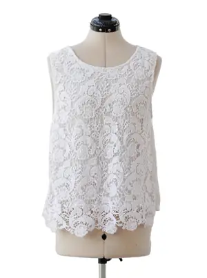 Blusa encaje blanco sin mangas textura floral
