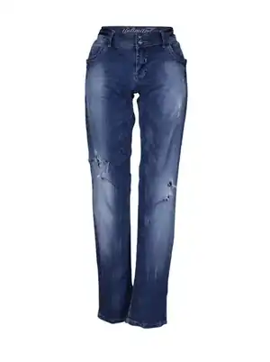 Jeans desteñido con hoyos