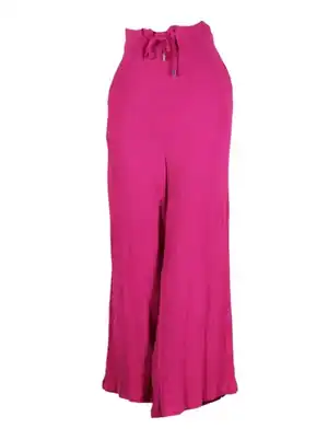 Pantalón fluido rosa ajuste metálico