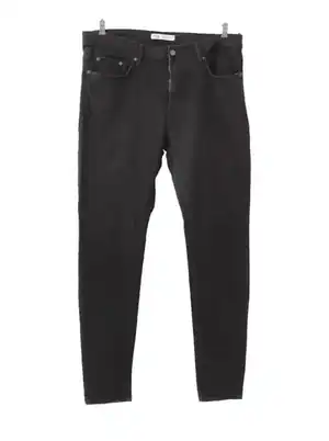 Jeans negro slim clásico tiro medio básico
