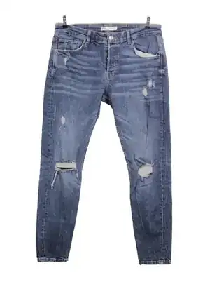 Jeans slim fit desgastados azul claro