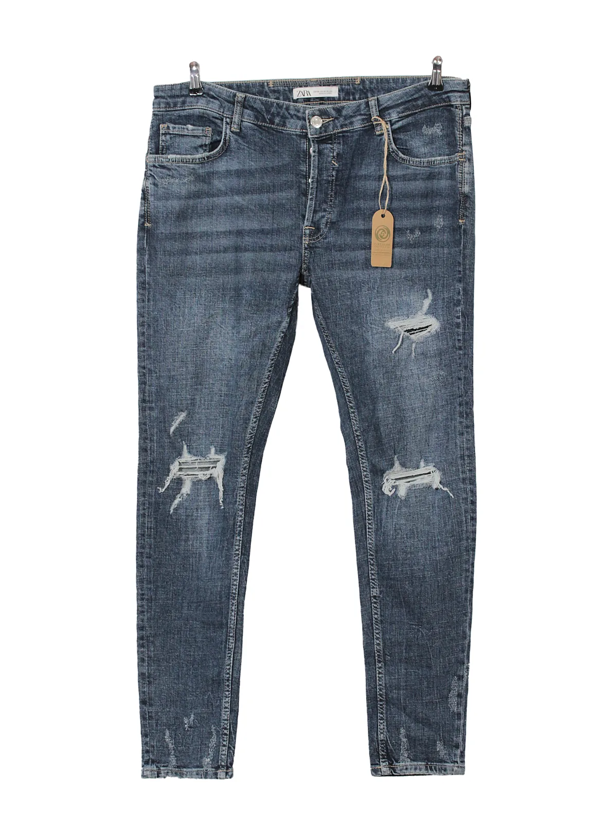 Jeans skinny desgastados tiro medio
