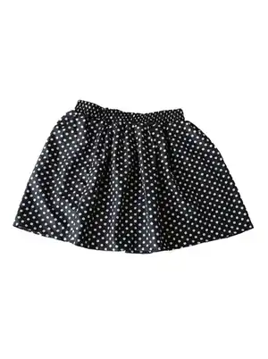 Falda a puntos blanco y negro